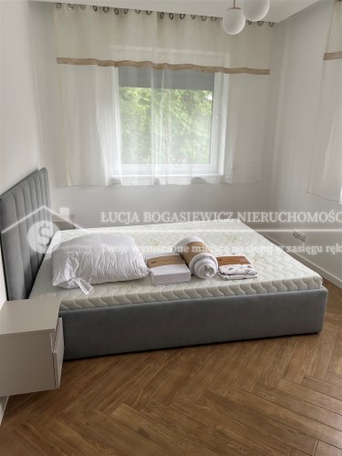 Nowoczesna łazienka w mieszkaniu na sprzedaż Biels