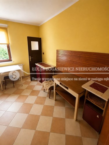 Dom z działką budowlaną w Kaniowie — oferta dla os